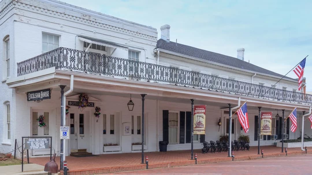 The Excelsior House Hotel, Jefferson — ironwork balcony and brick sidewalk